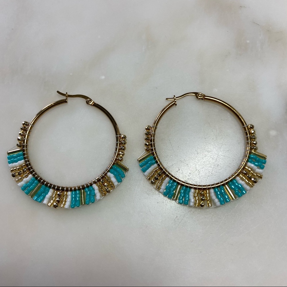 Gold hoop earrings with beads